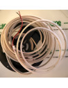 Silicone-sleeved amber COB strip coiled on the reel