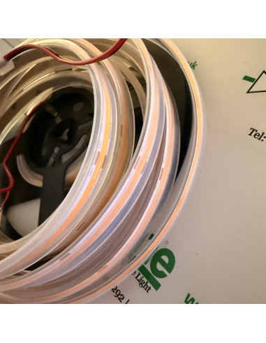 Side view of the clear IP67 sleeve on the amber COB strip